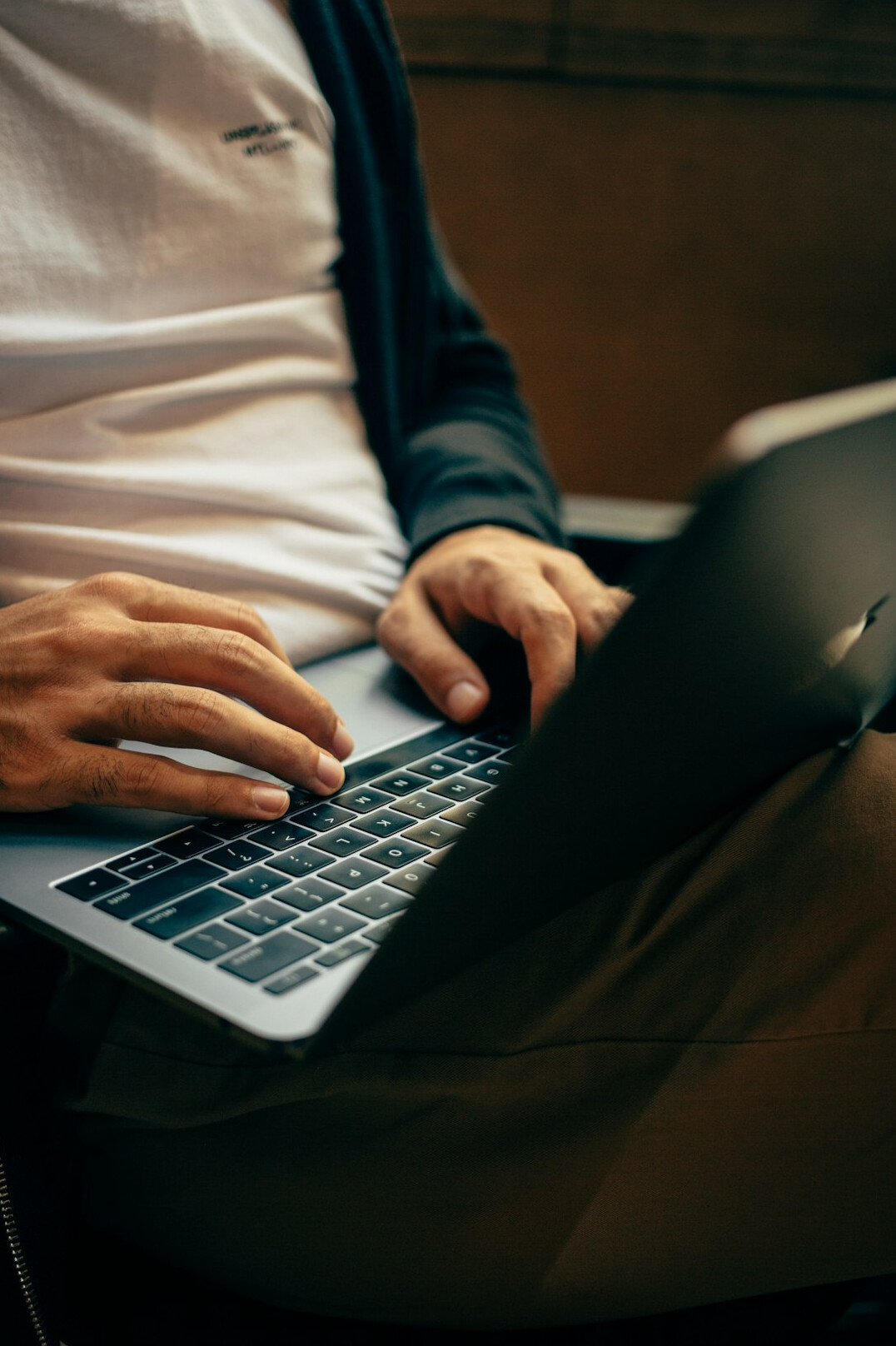 person using laptop software
